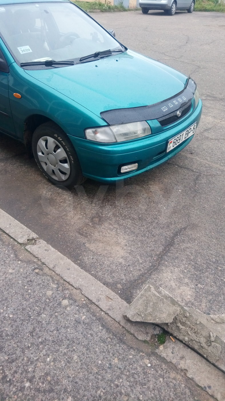 Mazda 323 BA, 1997 г.