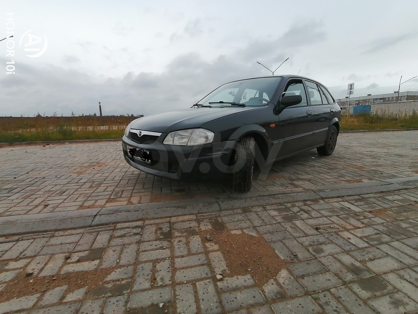 Mazda 323F, 1999 г.